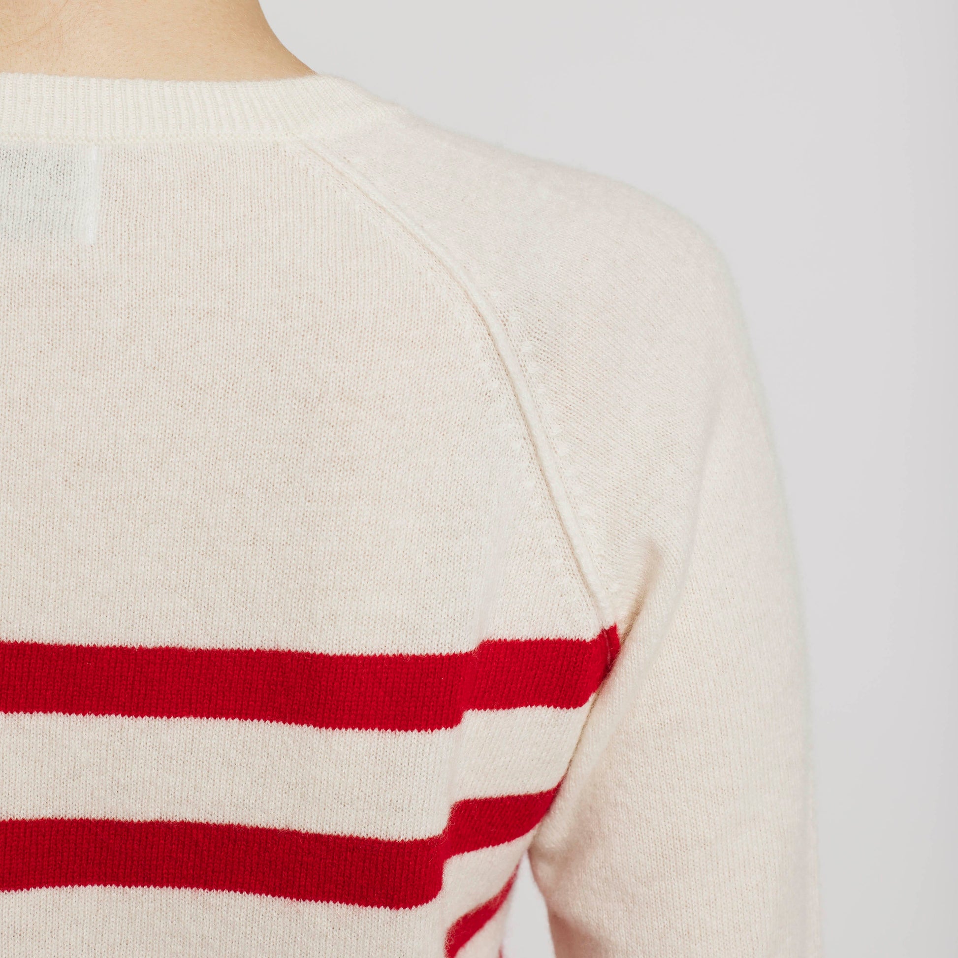 Alabaste Le Breton cashmere striped sweater in red and cream, back view, 100% Mongolian cashmere, fully-fashioned with raglan sleeves.