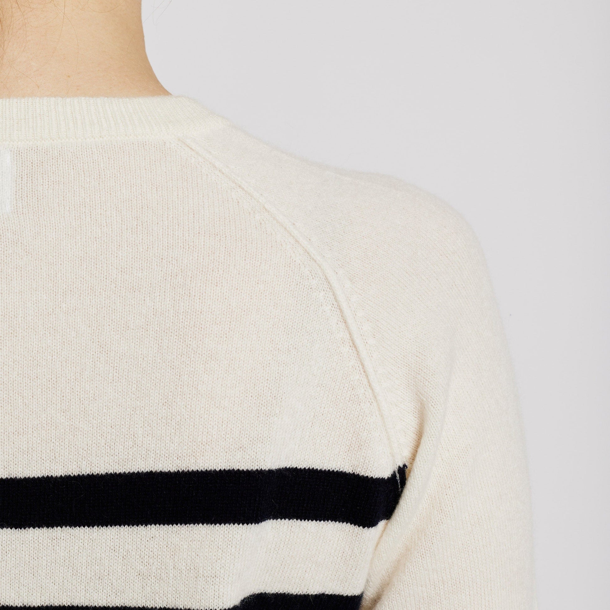 Alabaste Le Breton cashmere striped sweater in black and cream, size S, back view, 100% Mongolian cashmere, fully-fashioned with raglan sleeves.