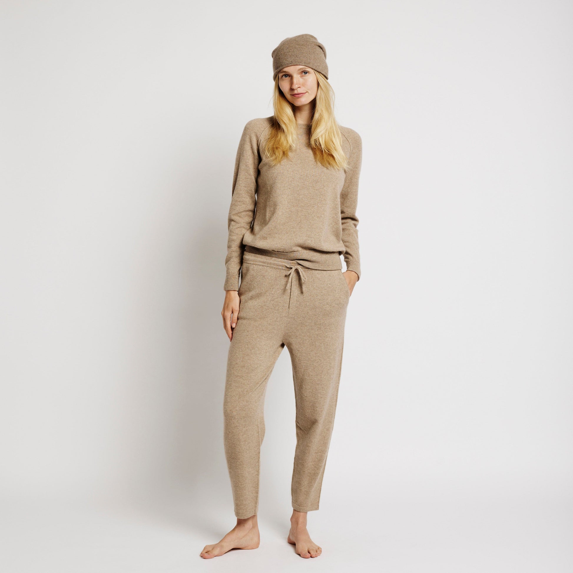 Alabaste Cashmere Joggers in oatmeal beige, wearing size small, styled with matching oatmeal cashmere sweater, 100% Mongolian cashmere.