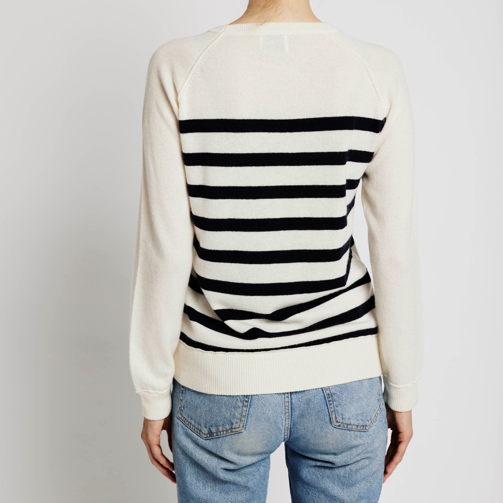 Alabaste Le Breton cashmere striped sweater in black and cream, back view, 100% Mongolian cashmere, fully-fashioned with raglan sleeves.